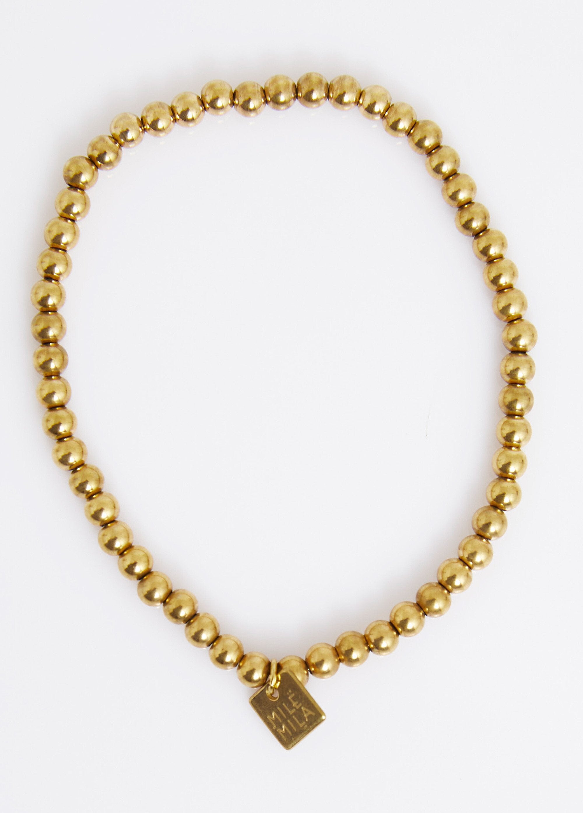 Elastic_bracelet_with_beaded_balls,_steel_Golden_FA1_slim